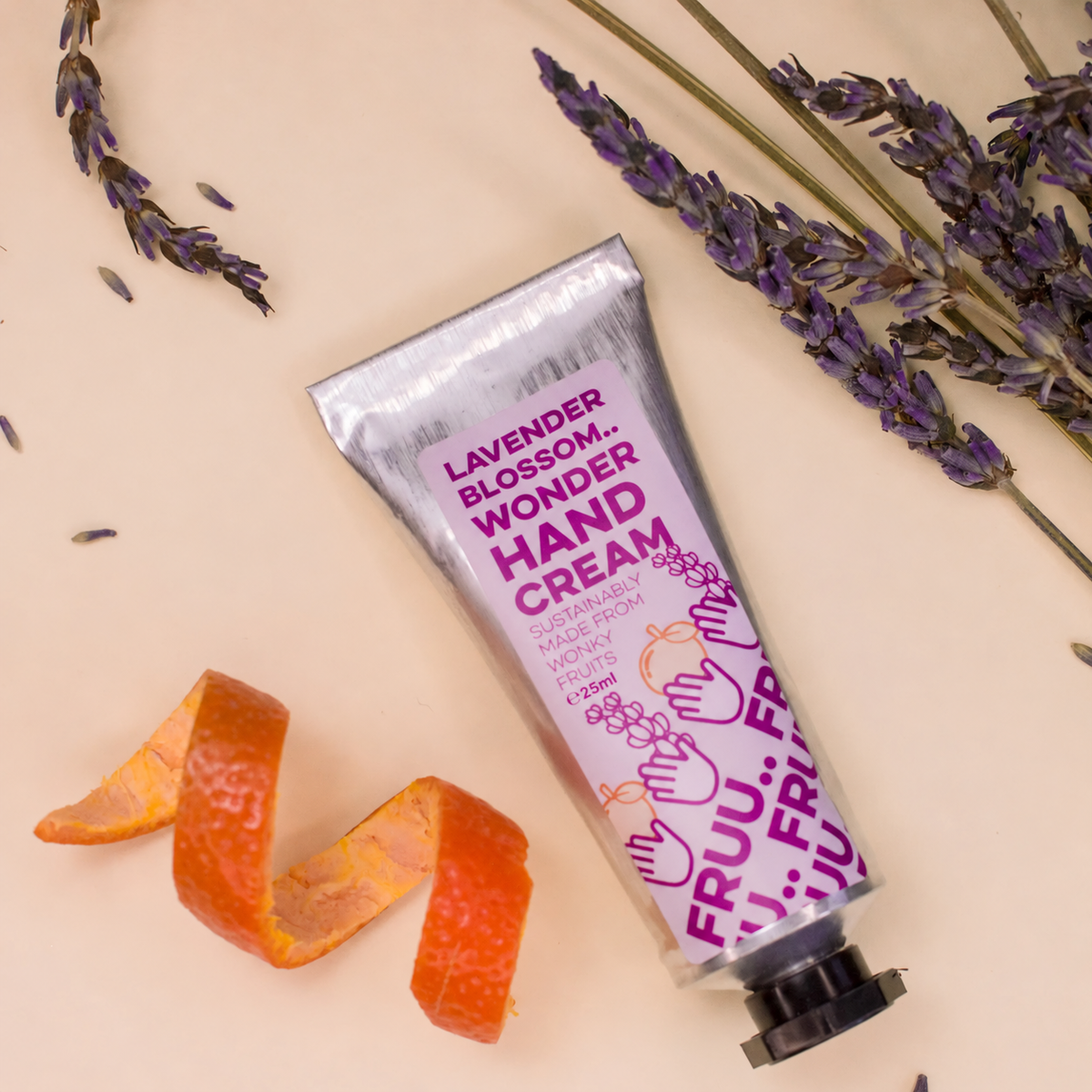 Lavender Blossom Wonder Hand Cream with lavender sprigs and orange peel